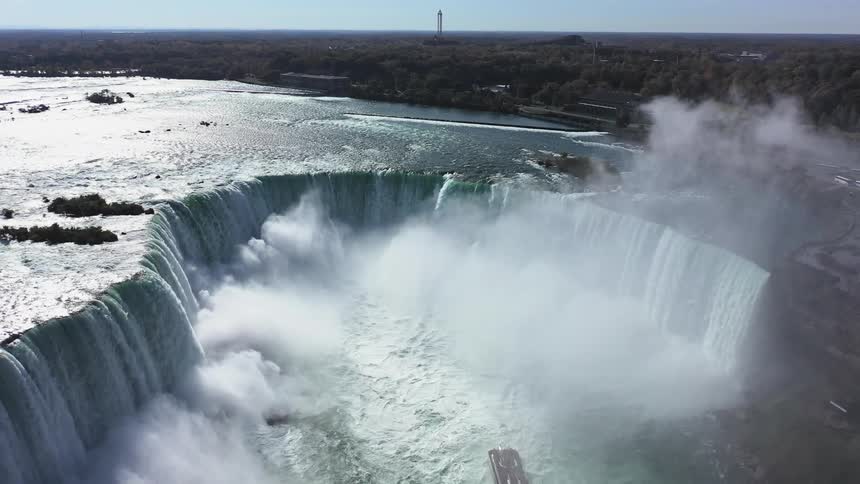 Aerial of tour boat getting close to niagra falls