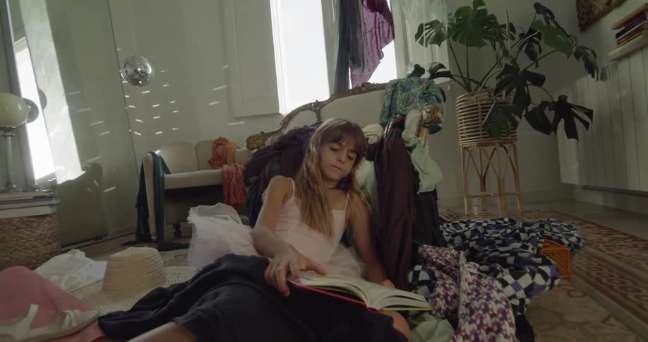 A girl sleeping and reading
