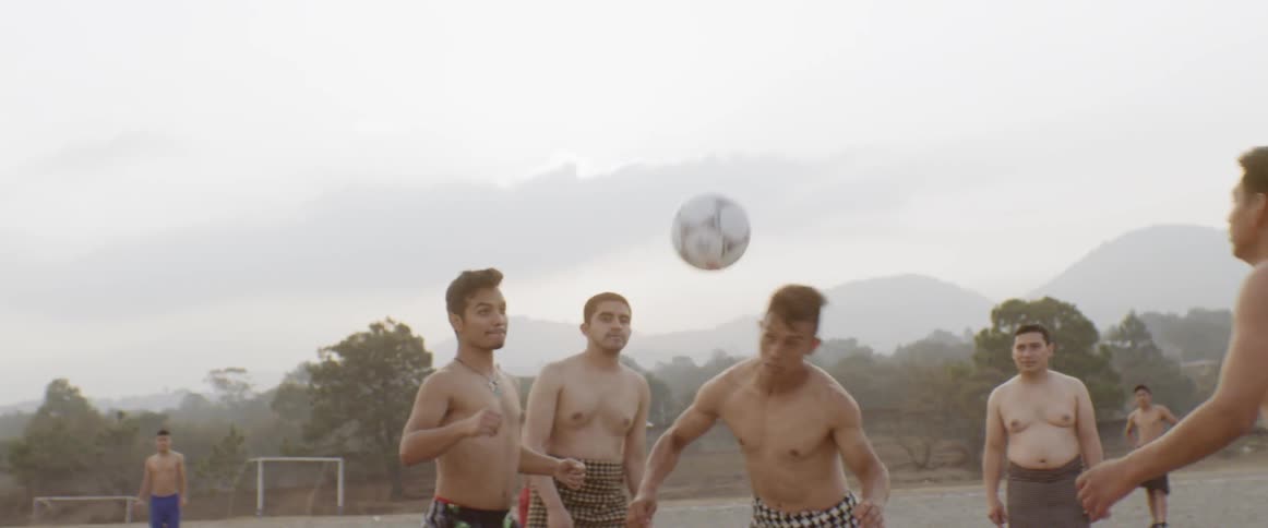Guys playing soccer