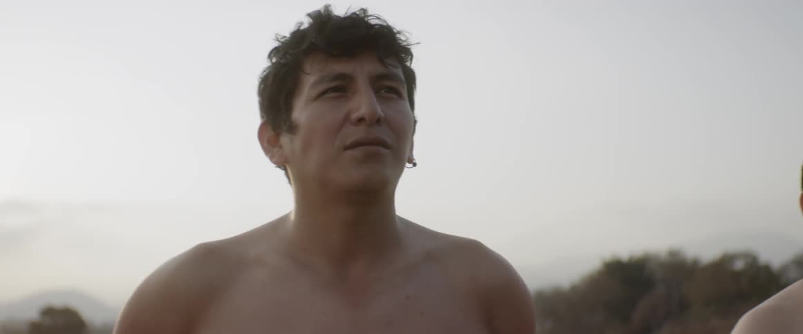 A group of shirtless man standing