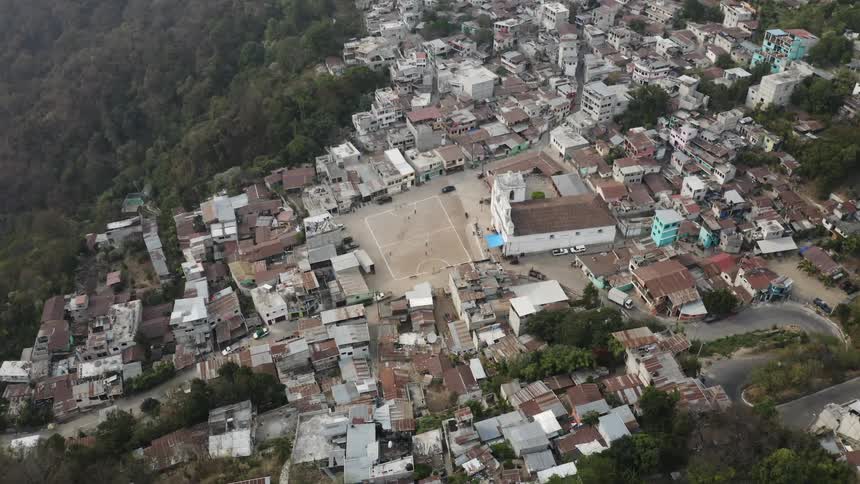 An aerial view of a city in the hill