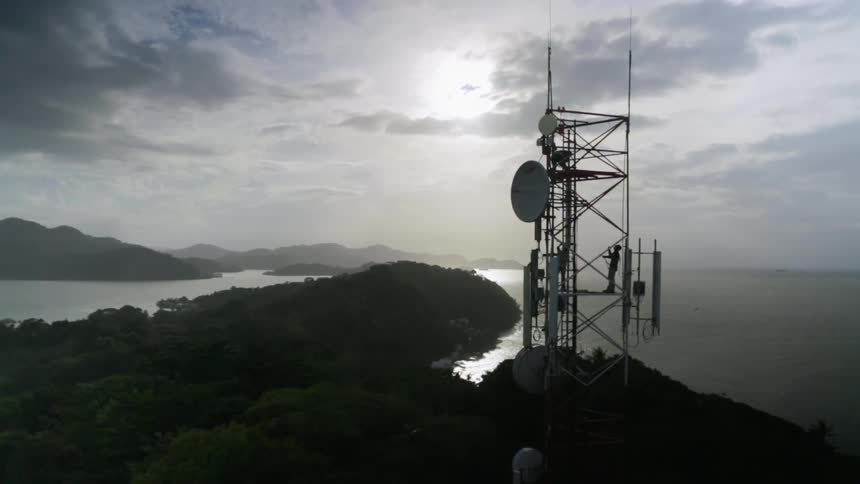 A scenery of a communication tower at cloudy days