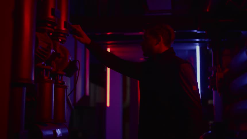 Man touches a robot with his fingers