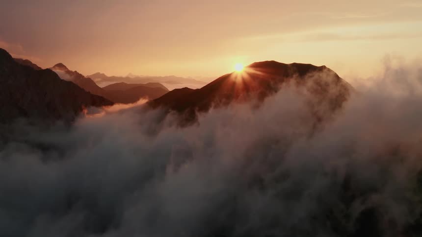 A scenery of a mountain at dawn