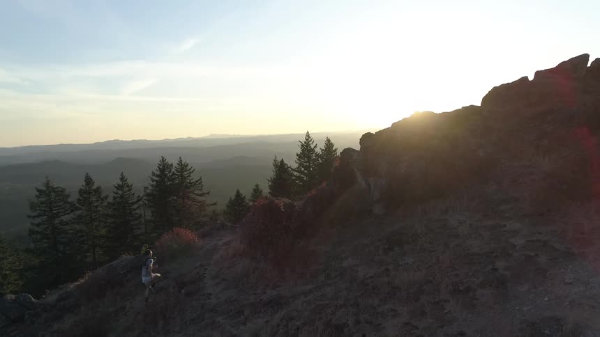 An aerial view of rock mountain at dawn