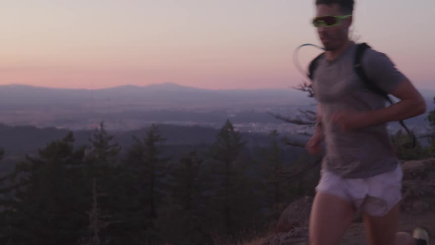 A man runs in shorts