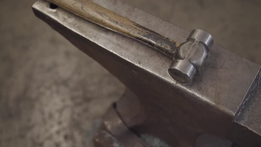 Hammer lays on top of a metal device