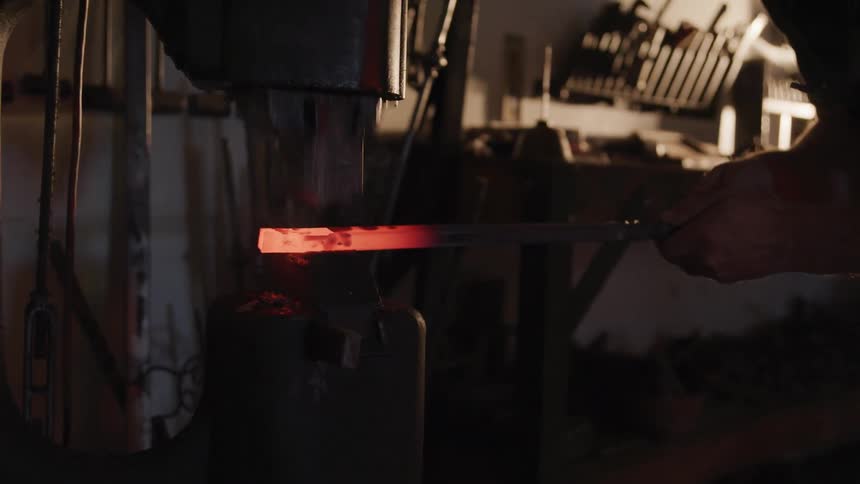 A man forging an iron