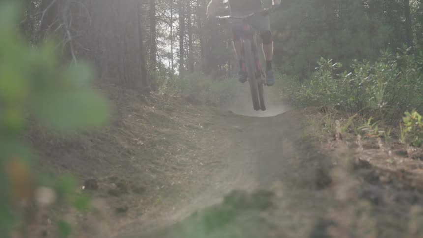 A person is riding a bike outdoors