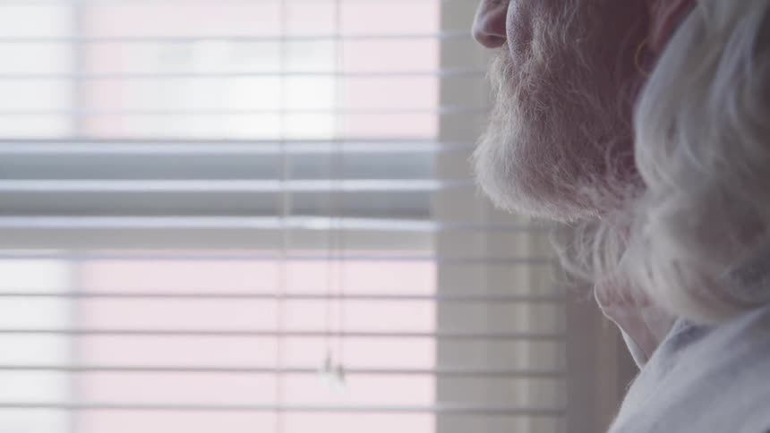 A face of an old man contemplating