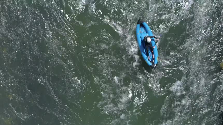 A view of a man using canoe