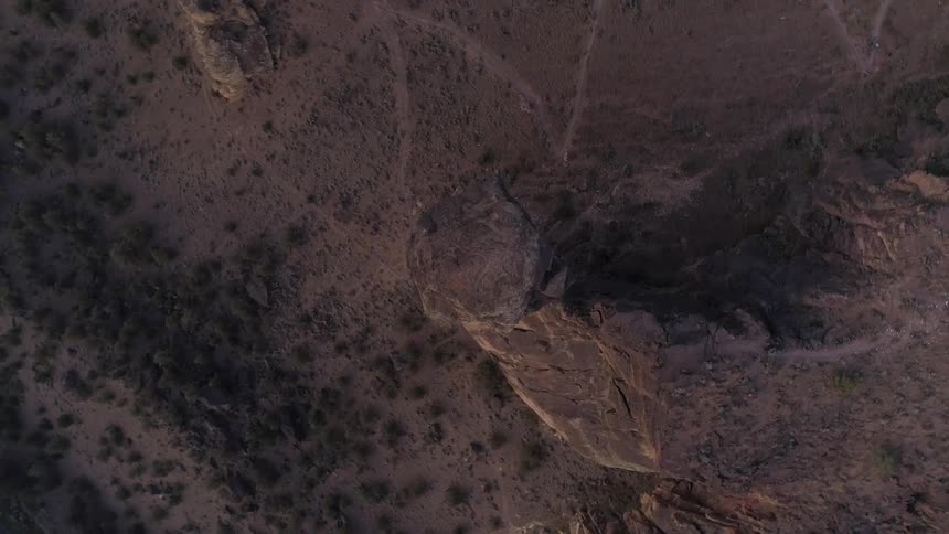 An aerial view of a mountain landscape is displayed