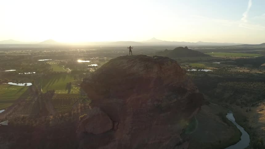 Man ontop of a rock