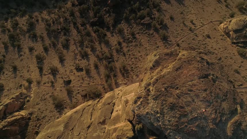 An aerial view of a rocky cliff