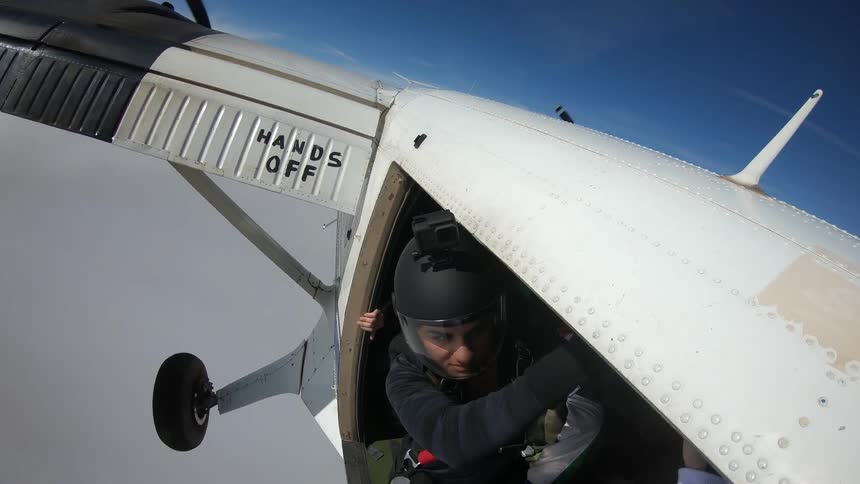 Many people jump out of a airplane