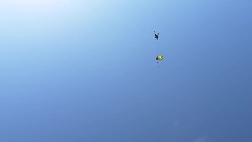 A group of men doing skydive