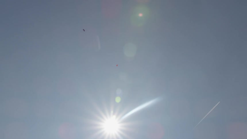 A view of a sun flare at the sky