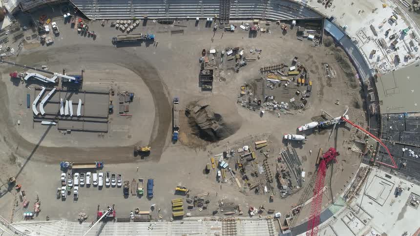 Construction equipment works on a jobsite