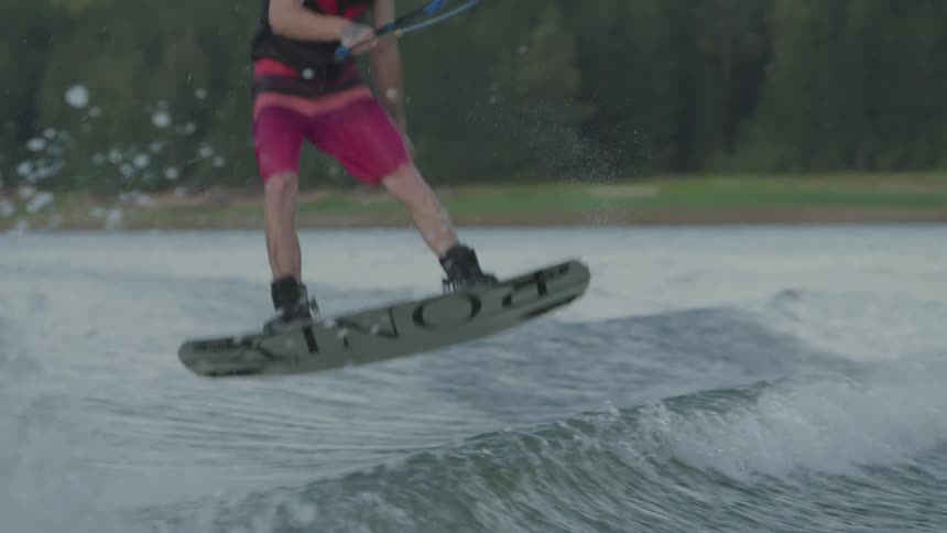 A person is doing water sports on a lake