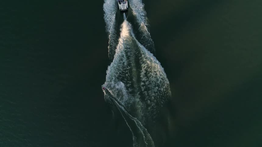 An aerial view of a boat and man