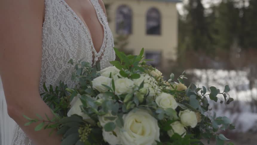 Bride holding flower bouquet