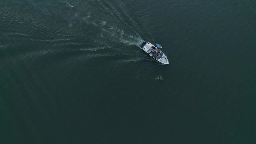 A boat sailing in the lake