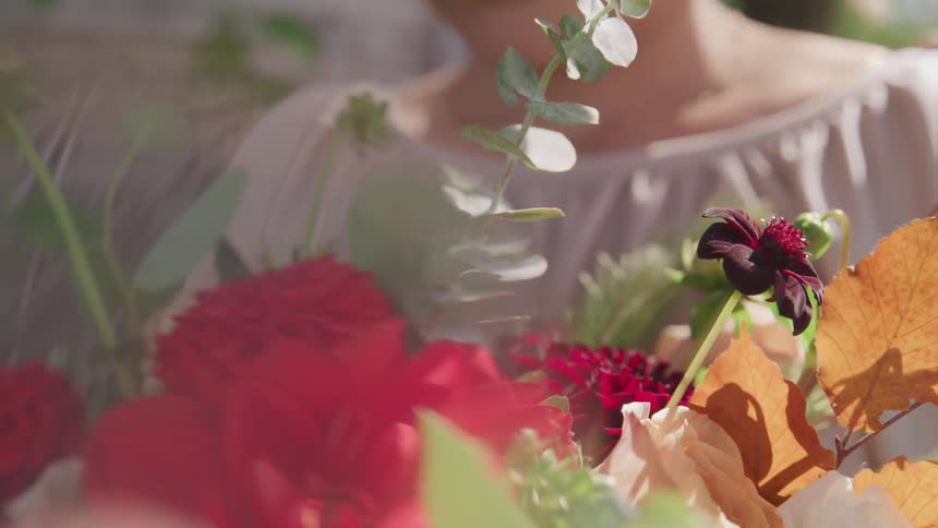 A groom with a bouquet of flower