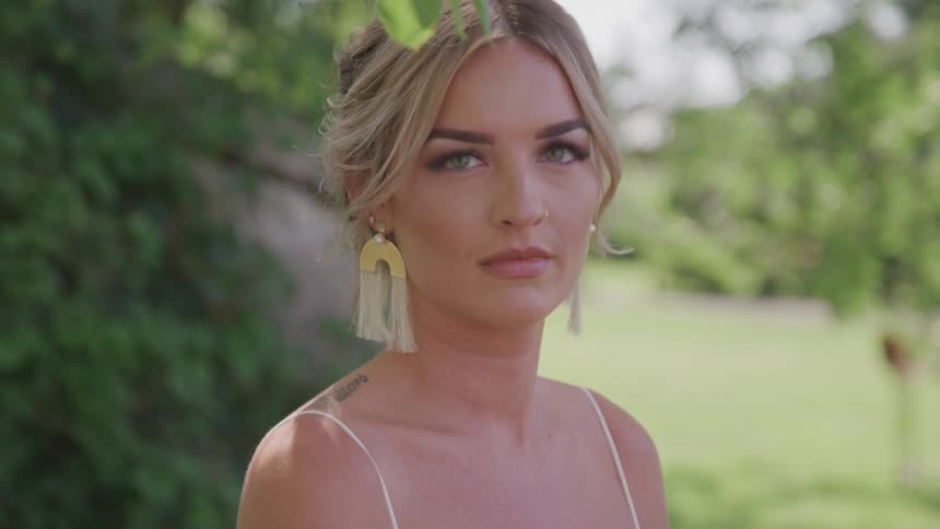 A beautiful woman staring at the camera