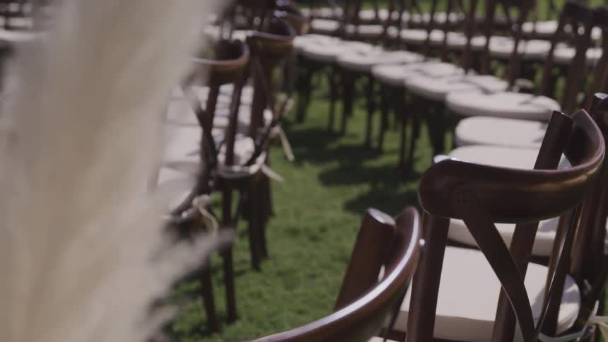 Chairs are placed outside in a circle