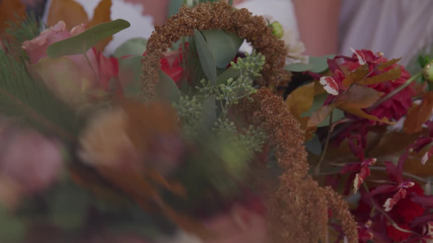 A close up of flowers blowing in the wind