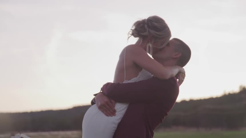 Man and woman embracing