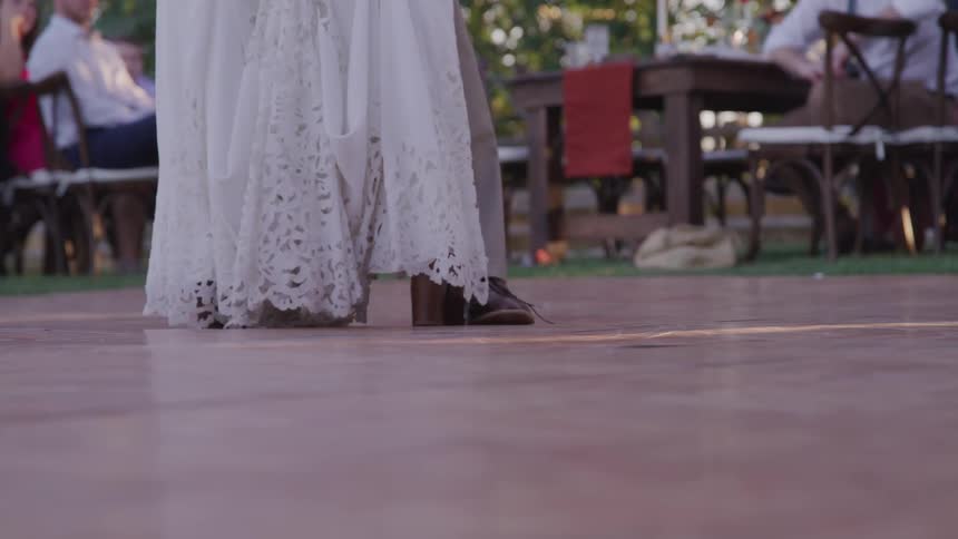 Groom and bride dancing at the wedding party