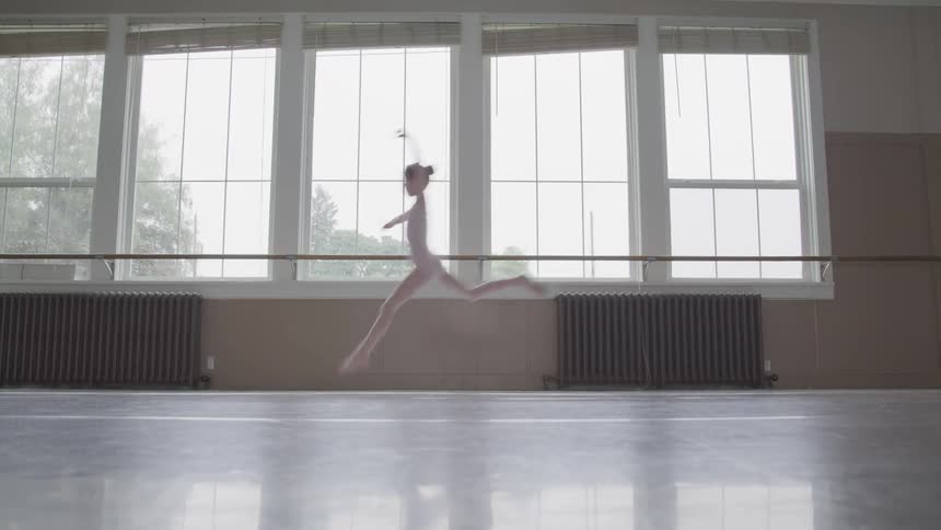 A girl ballerina exercising