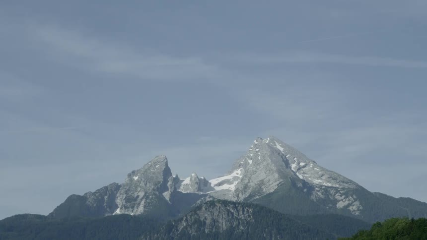 A scenery of a snowy mountain peak
