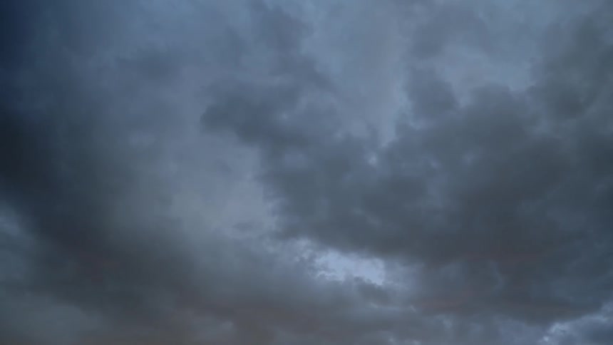 Worms eye view of dark storm clouds