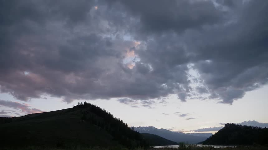 Time lapse of dark clouds moving across the sky