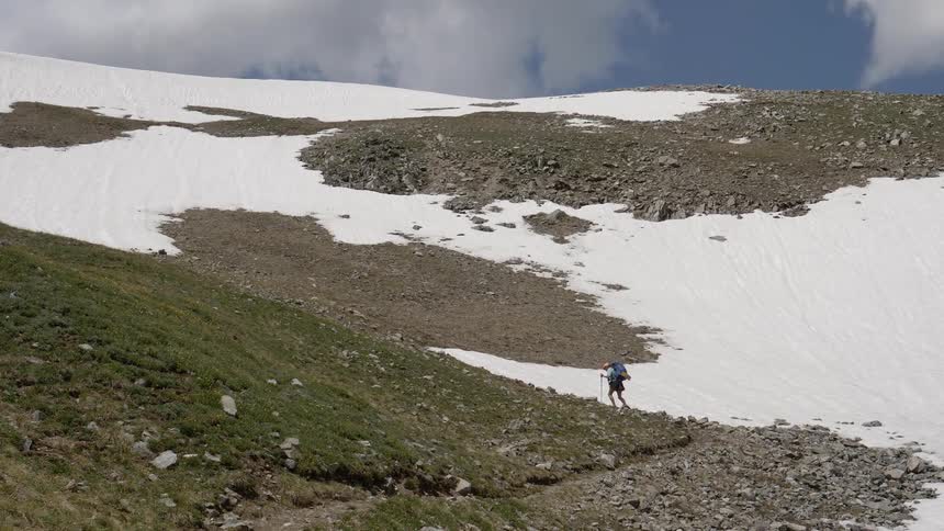 Man hiking alone at the hill