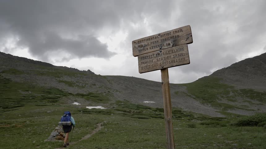 A scenery of a man hiking