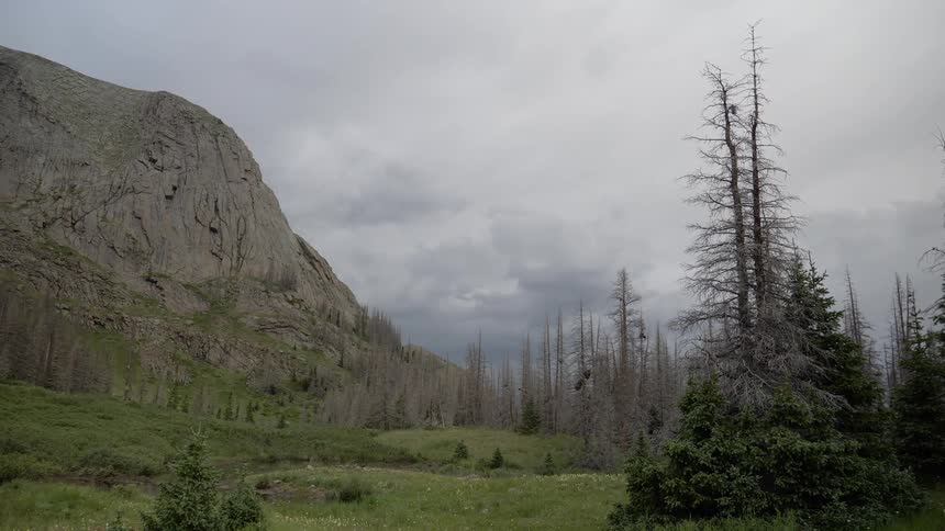 View of rock mountain cliff on a cloudy day