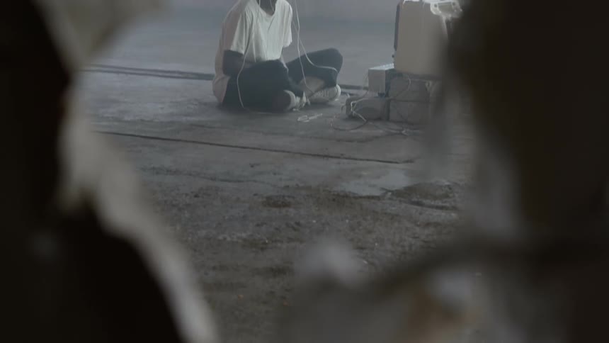 A portrait of a boy sitting