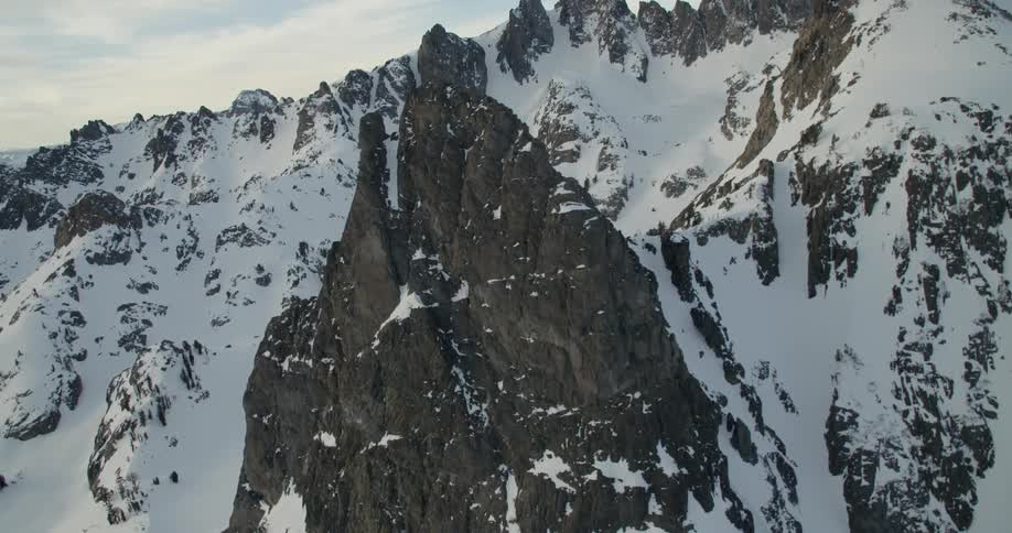 Aerial view of some snow covered mountain tops