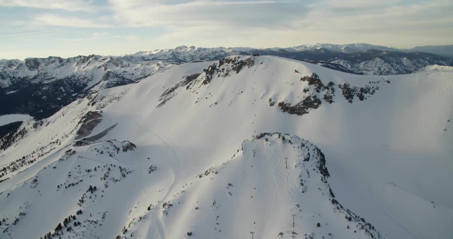 Aerial shot of snow covered mountains