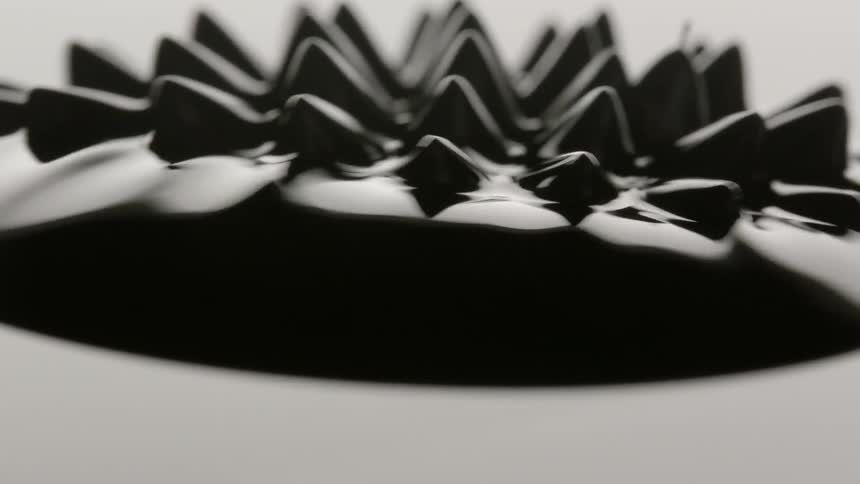 A black liquid dancing