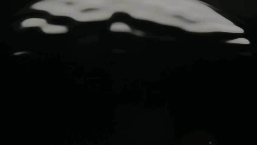 Shiny black pointy objects recede and grow