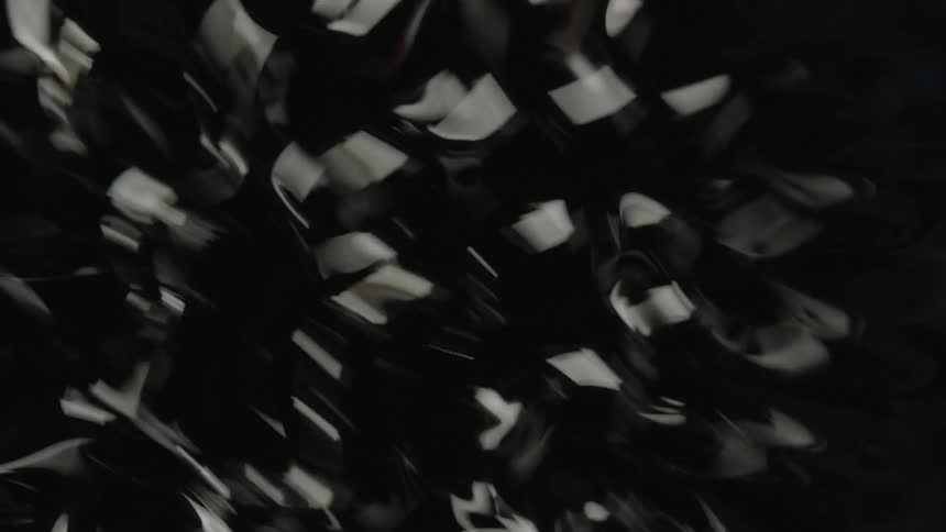 Dark liquid falling in to a dark space