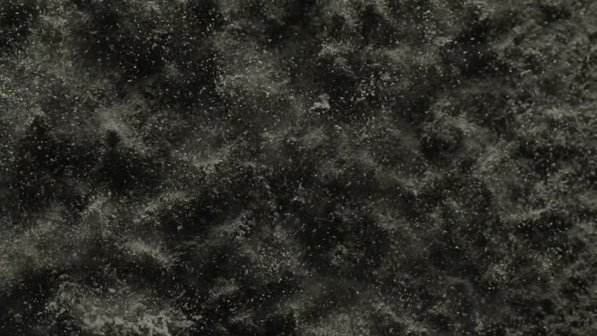 Sand with water rushing up on it