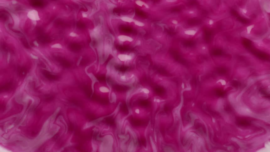 Pink liquid moving