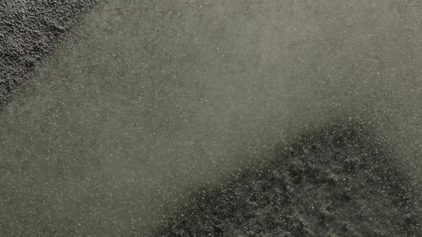 Boiling water sizzles in a pan