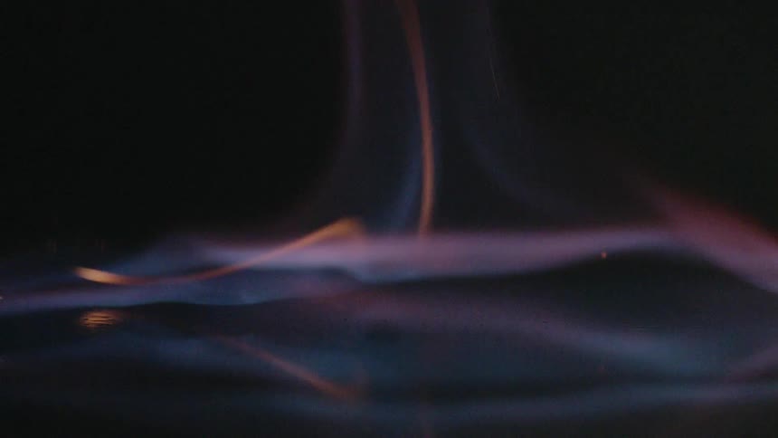Sparks fall on the flammable surface and erupts into flames