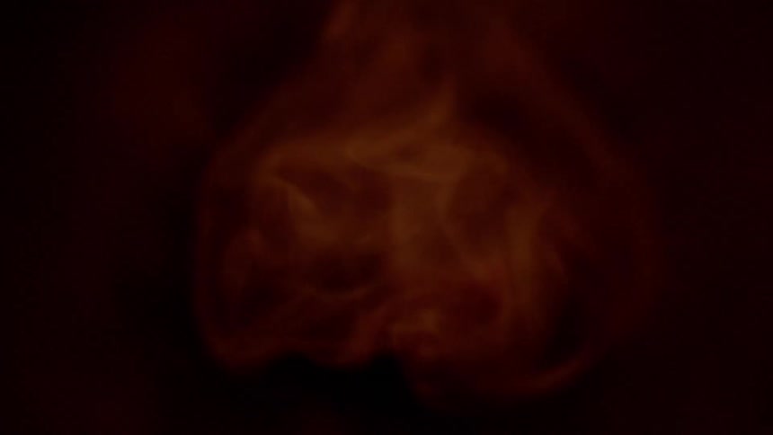 A close up view of a flame on a tube